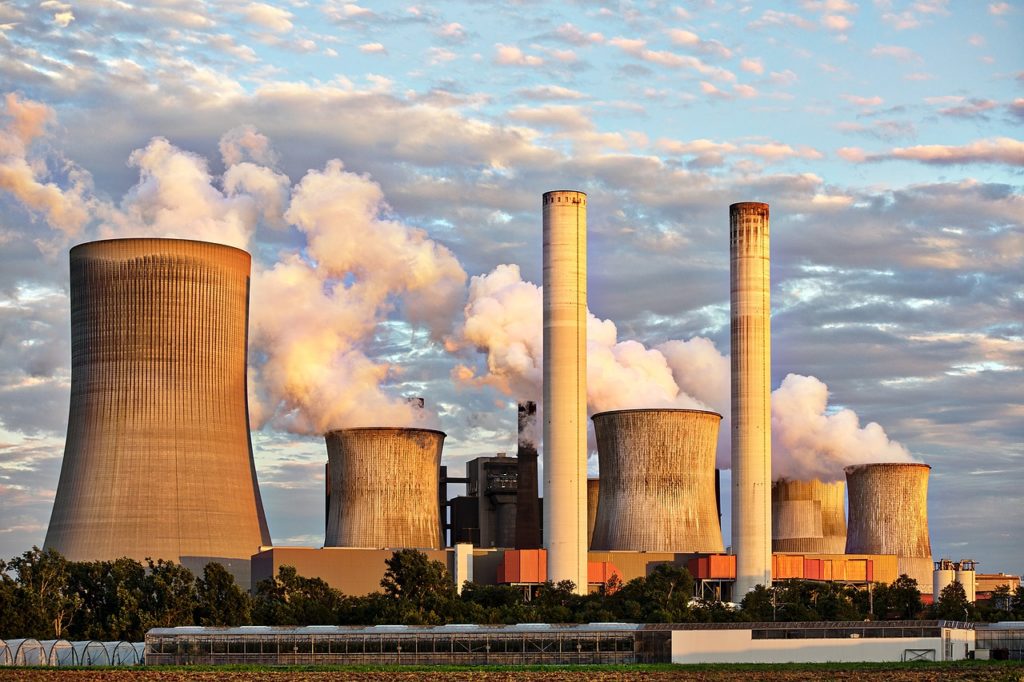 Power Plant with smoke in the sky